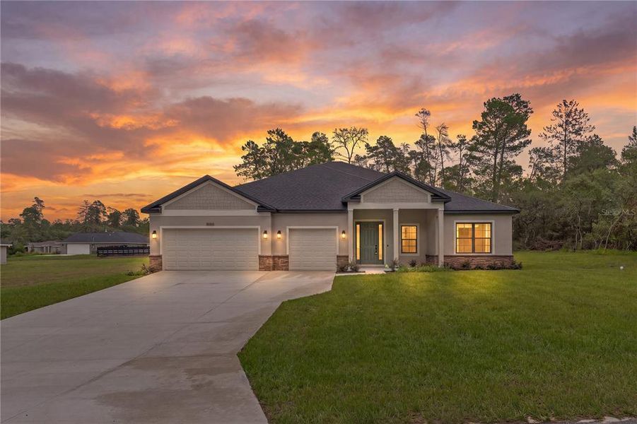 Front exterior of a new home in , Dunnellon, FL, highlighting curb appeal (Image 26).