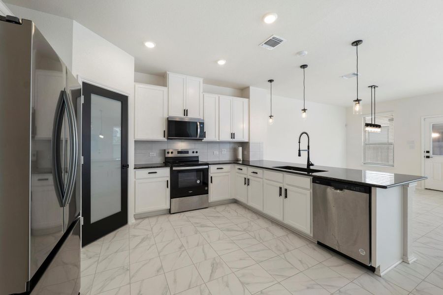 Furnished interior view inside a new home in Sonterra - Cool Water, Jarrell (Image 8).