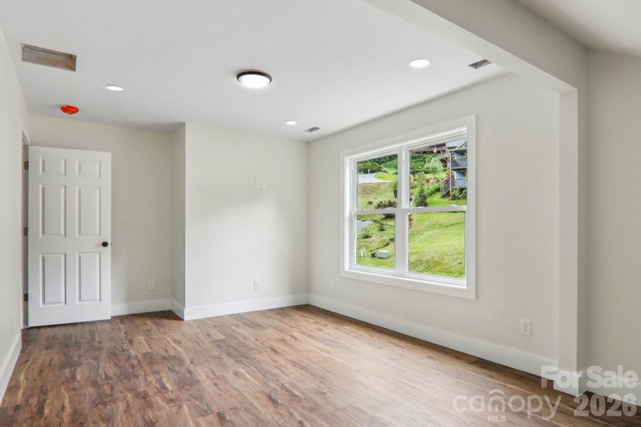 Spacious, unfurnished interior of a new home in , Waynesville (Image 24).
