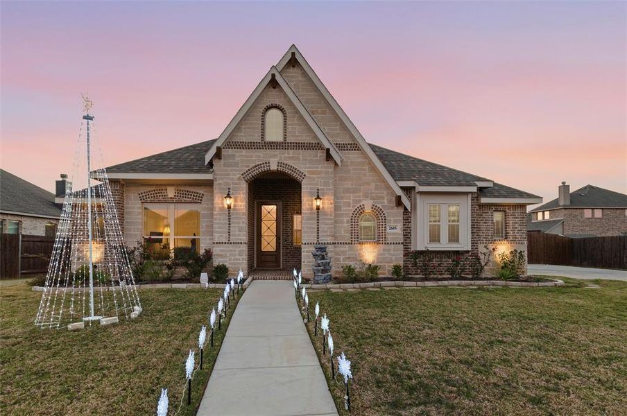 Front of home at twilight, and ready for the holidays! Front of home at twilight, and ready for the holidays!