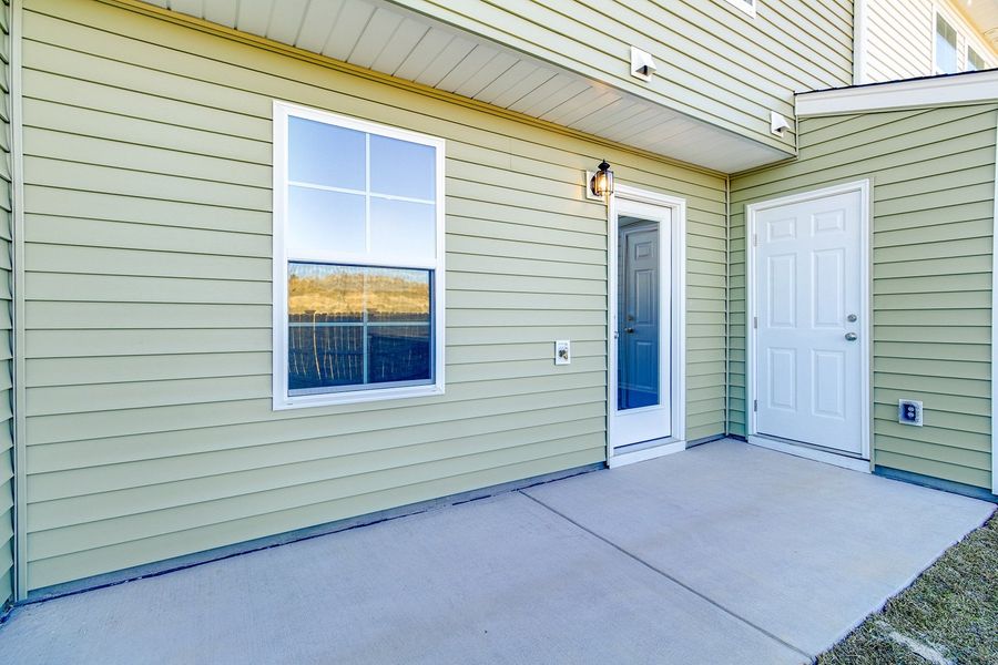 Exterior details and patio area of a home in Astoria, Columbia (Image 3).