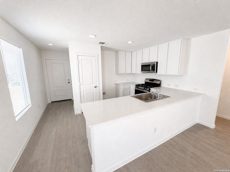 Furnished interior view inside a new home in Sapphire Grove, San Antonio (Image 7).