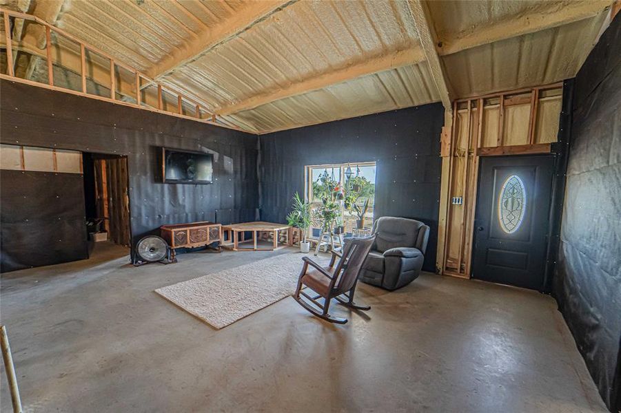 Living area with concrete floors