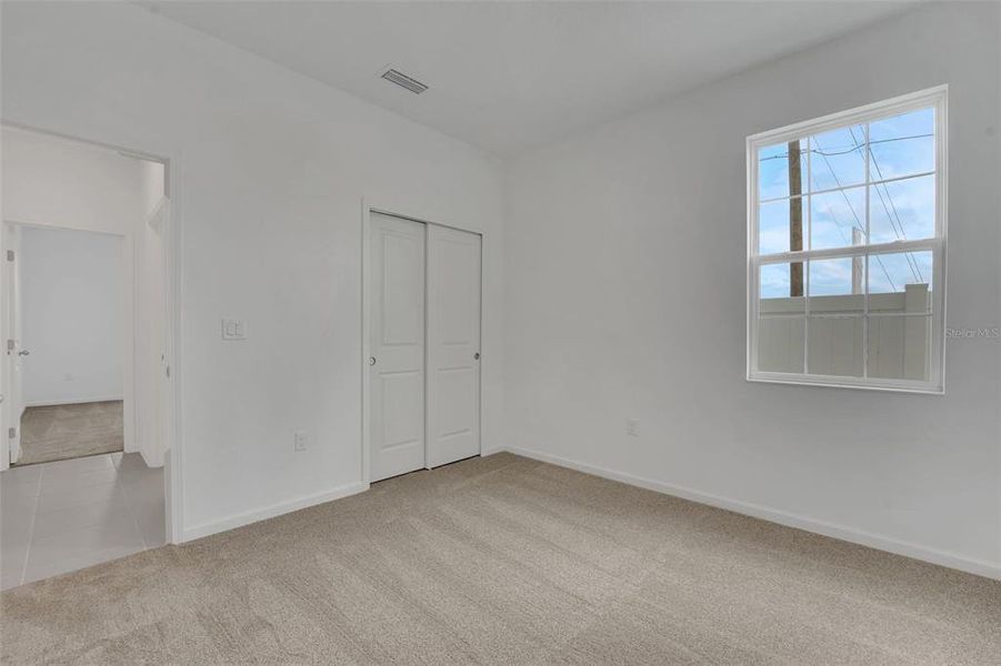 Spacious, unfurnished interior of a new home in Annabelle Estates, Winter Haven (Image 16).