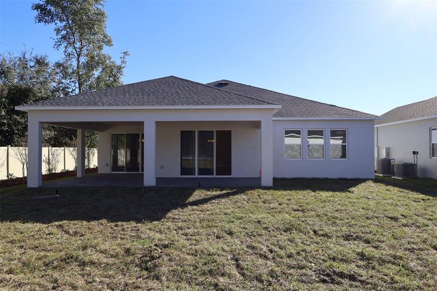 Exterior details and patio area of a home in Emerson Pointe, Apopka (Image 17).