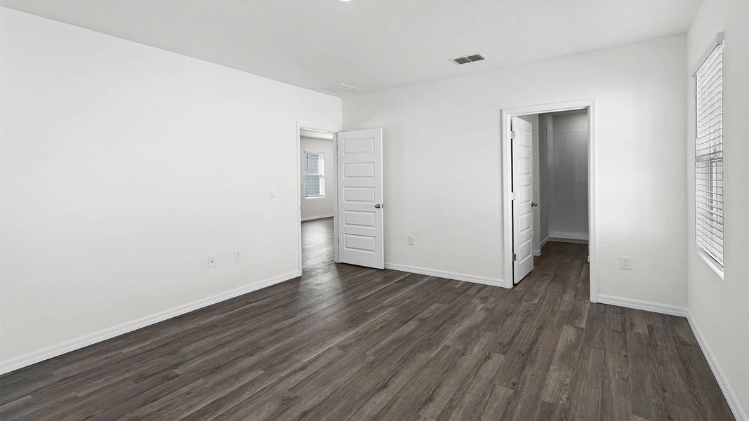 Representative unfurnished interior of a home built from the ASTOR by D.R. Horton in Harmony at Lake Eloise, Winter Haven (Image 15).