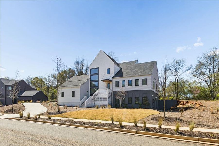 Front exterior of a new home in , Roswell, GA, highlighting curb appeal (Image 28).