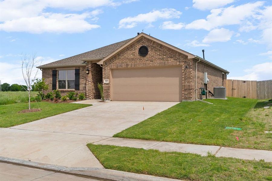 Front exterior of a new home in Fox Landing, Caddo Mills, TX, highlighting curb appeal (Image 22).
