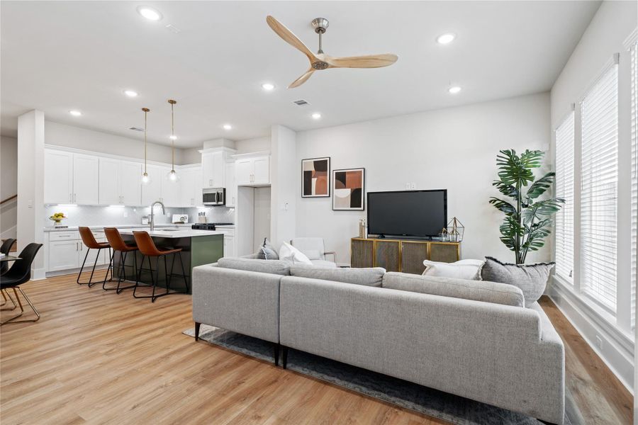 Where mornings start with natural light and evenings wind down in comfort, this living room is designed for the moments in between.