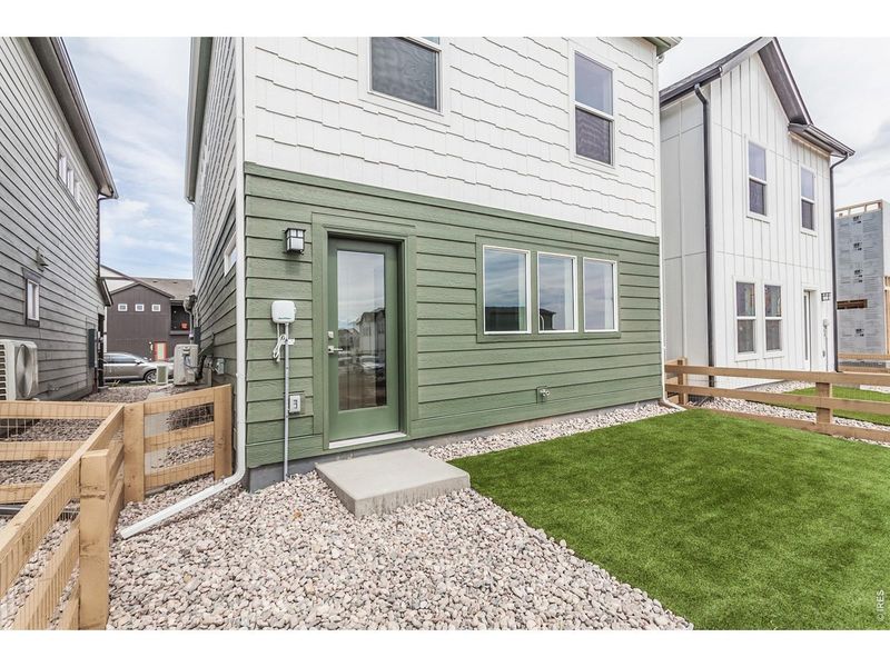 Exterior details and patio area of a home in Bloom Trailblazer Collection - Single Family Homes, Fort Collins (Image 23). Exterior details and patio area of a home in Bloom Trailblazer Collection - Single Family Homes, Fort Collins (Image 23).