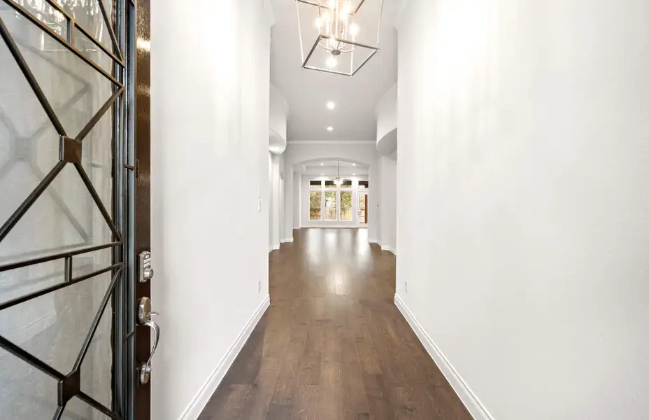 Representative unfurnished interior of a home built from the 3068 by Ravenna Homes in The Woodlands Hills 65′, Willis (Image 20).