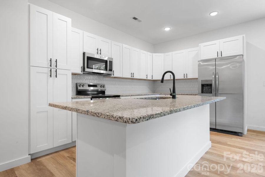 Furnished interior view inside a new home in , Taylorsville (Image 6).