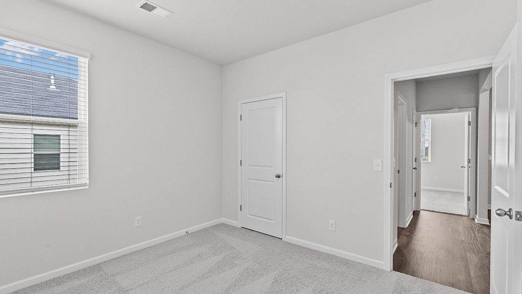 Spacious, unfurnished interior of a new home in Highland Hills, Graniteville (Image 25).