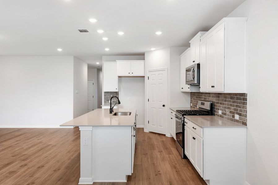 Representative furnished interior of a home built from the Cartwright by Ashton Woods in Rolling Glen, Hutto (Image 7).