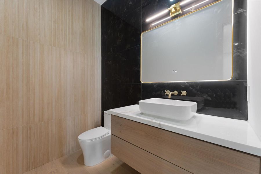 Exquisite Powder Room on the first floor. Exquisite Powder Room on the first floor.