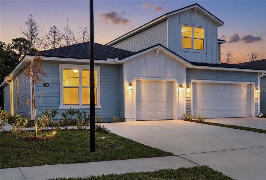 Front exterior of a new home in , Palm Coast, FL, highlighting curb appeal (Image 25).