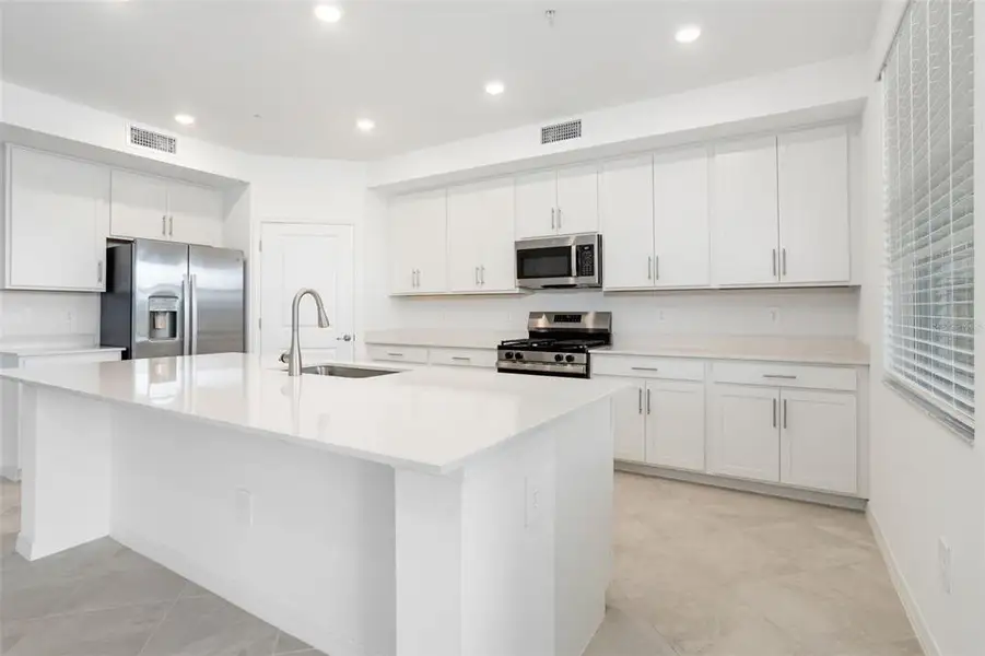 Furnished interior view inside a new home in Calusa Country Club, Lakewood Ranch (Image 10).