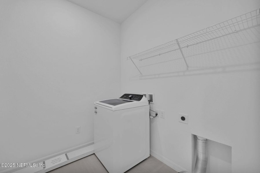 Furnished interior view inside a new home in Bradley Creek, Green Cove Springs (Image 11).