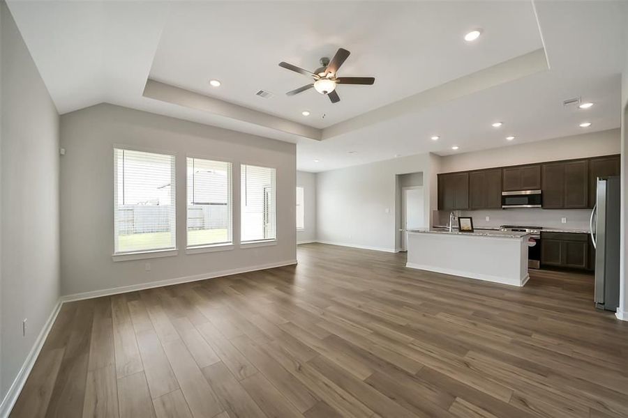 Spacious, unfurnished interior of a new home in Sunterra, Katy (Image 25).