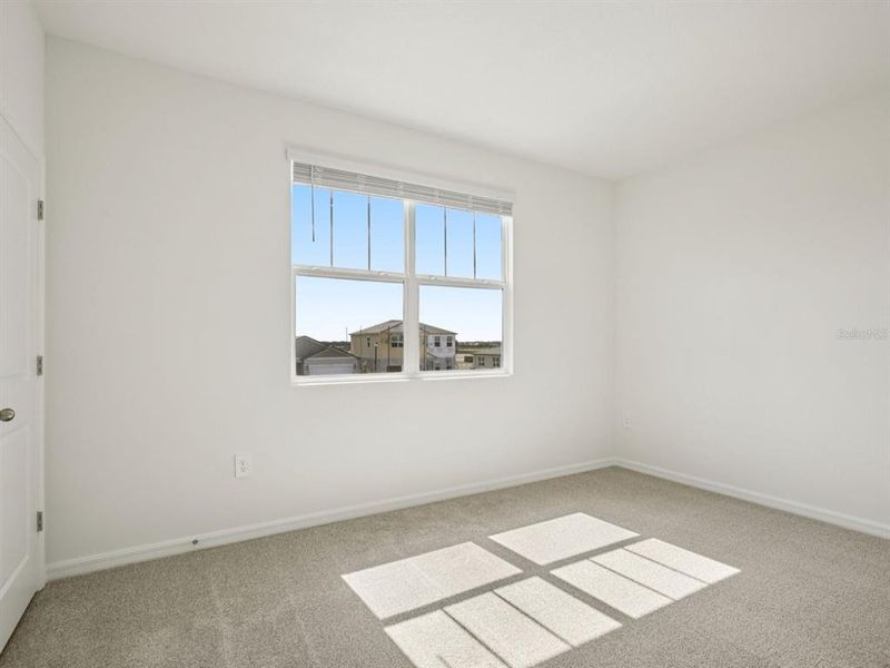 Spacious, unfurnished interior of a new home in Coasterra - Reserve Series, Palmetto (Image 38).