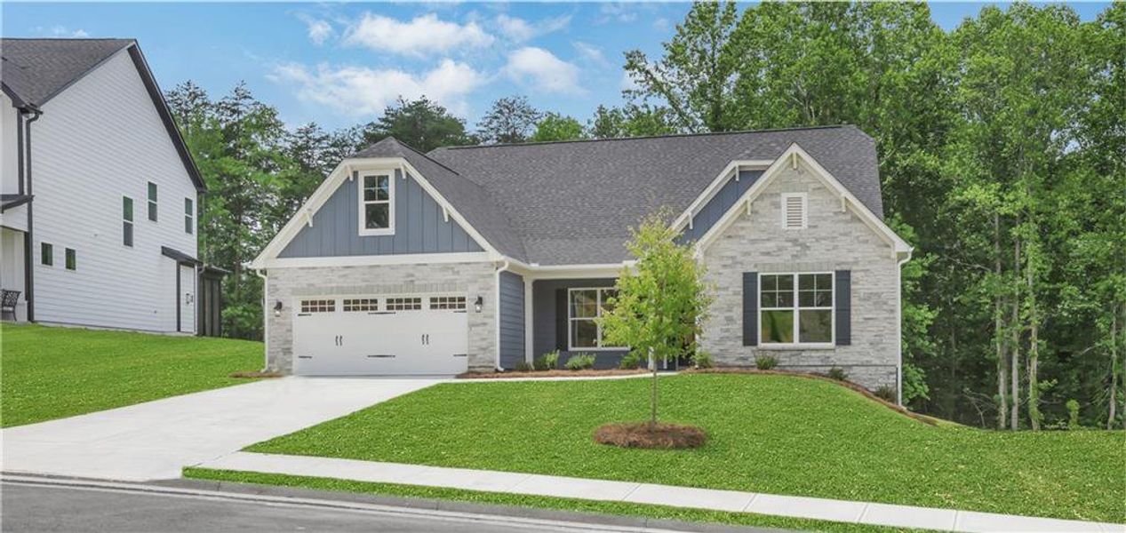 Front exterior of a new home in Arbor West, Dawsonville, GA, highlighting curb appeal (Image 25).