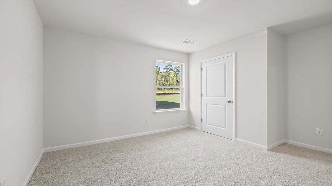 Spacious, unfurnished interior of a new home in Village Grove, Greenville (Image 21).