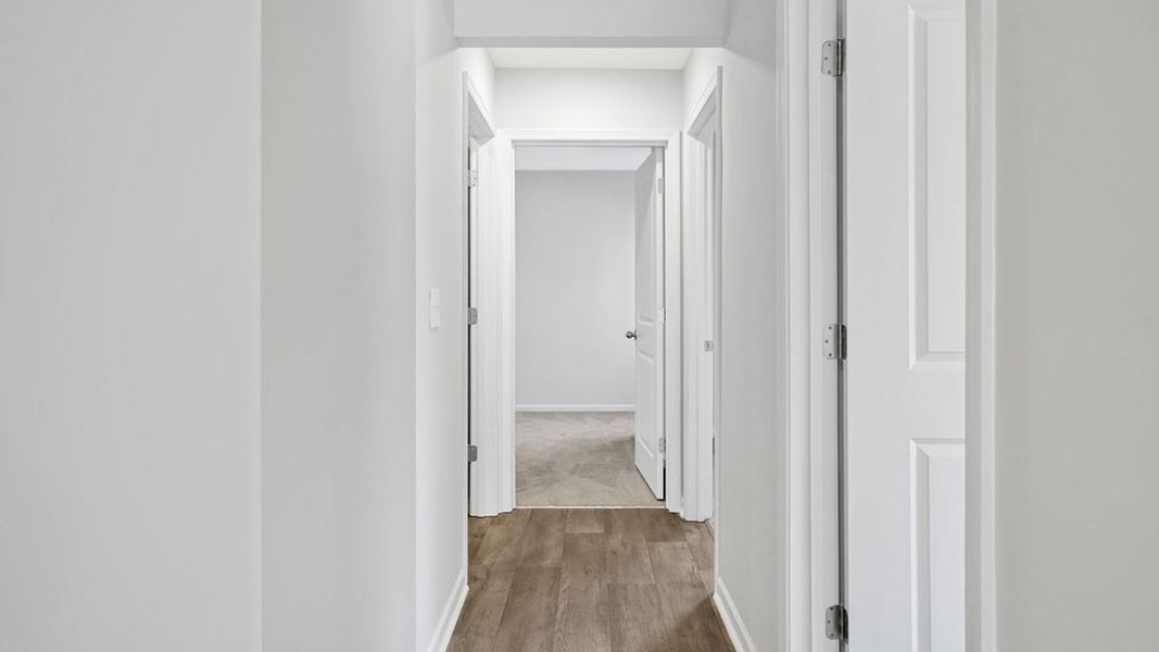 Representative unfurnished interior of a home built from the BAYSHORE by D.R. Horton in Indigo Preserve Townhomes, Leland (Image 26).