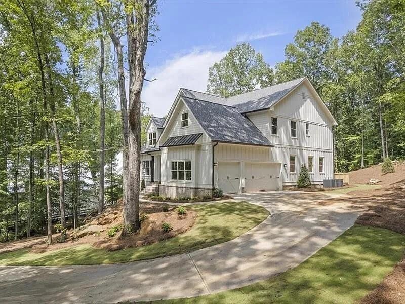 Front exterior of a new home in , Woodstock, GA, highlighting curb appeal (Image 26).