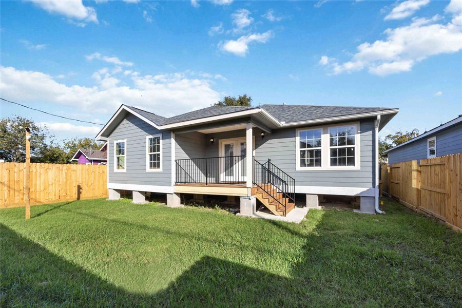 Fully fenced backyard offering privacy and plenty of room for outdoor activities.