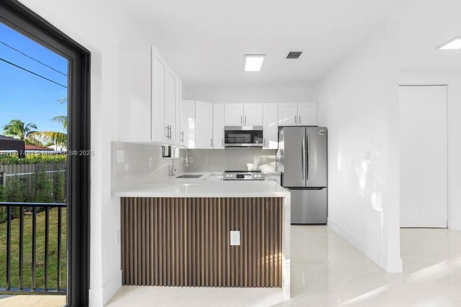 Furnished interior view inside a new home in , Miami (Image 11). Furnished interior view inside a new home in , Miami (Image 11).