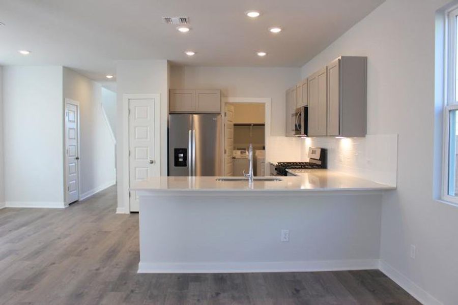 Furnished interior view inside a new home in The Hollows at Avery Centre, Round Rock (Image 3). Furnished interior view inside a new home in The Hollows at Avery Centre, Round Rock (Image 3).