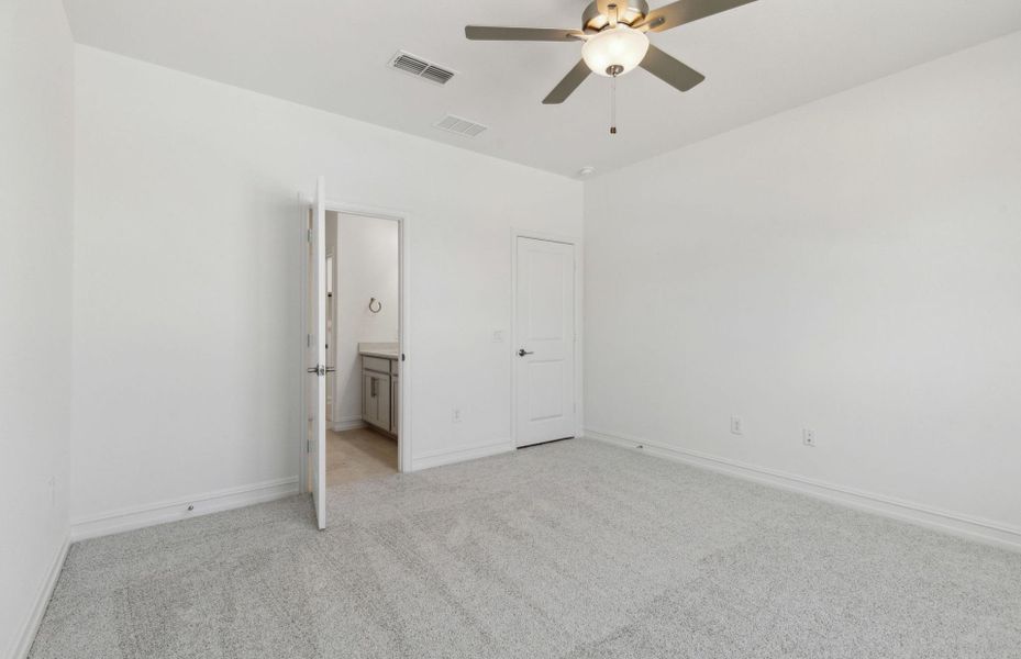 Elegant owner's suite with large windows and private bathroom Elegant owner's suite with large windows and private bathroom