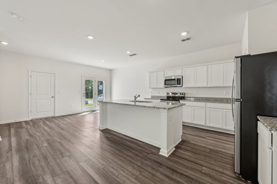 Representative furnished interior of a home built from the Neptune by Starlight Homes in Castlewood South, Taylor (Image 9). Representative furnished interior of a home built from the Neptune by Starlight Homes in Castlewood South, Taylor (Image 9).