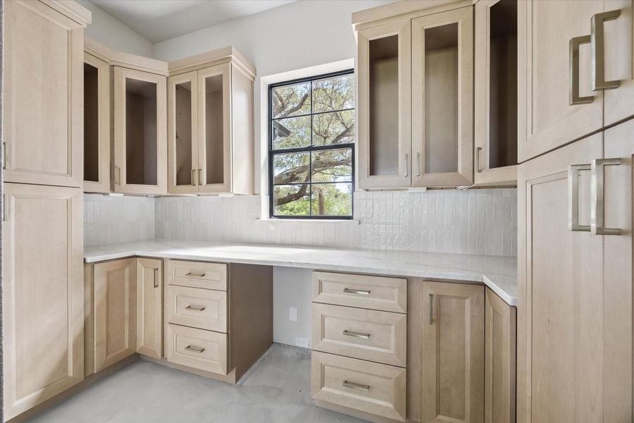 Pantry has lots of storage with wine fridge coming soon.