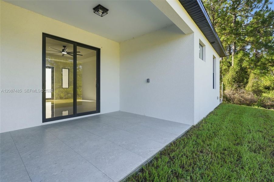 Exterior details and patio area of a home in , Lehigh Acres (Image 19). Exterior details and patio area of a home in , Lehigh Acres (Image 19).