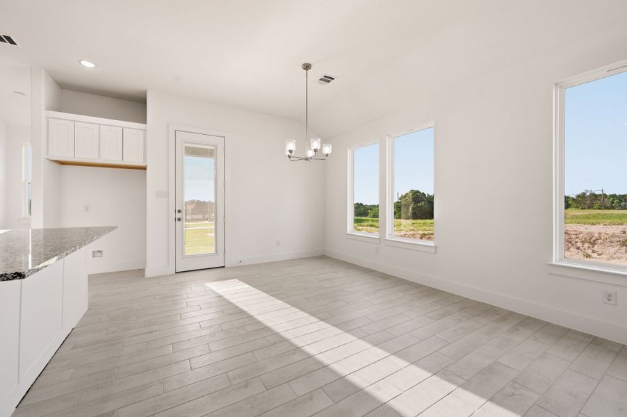 Spacious, unfurnished interior of a new home in Saddleback Estates, Boyd (Image 29).