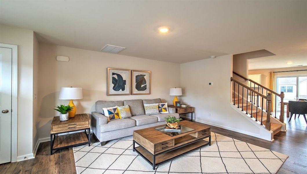 Representative furnished interior of a home built from the Clement by D.R. Horton in Virginia Commons, Arden (Image 8).