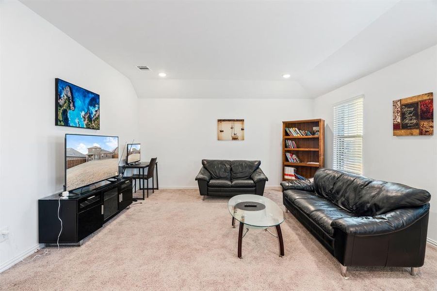 Upstairs Bonus Room could serve as an additional Family Room, Loft, or Game Room!