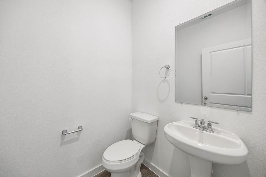 Furnished interior view inside a new home in Ellerden, Tomball (Image 7).