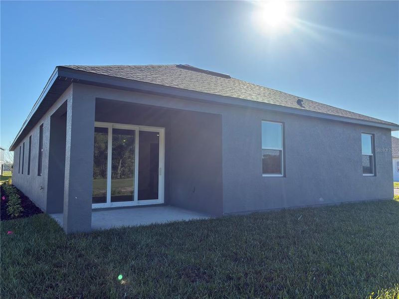Exterior details and patio area of a home in Oakfield Trails, Parrish (Image 3). Exterior details and patio area of a home in Oakfield Trails, Parrish (Image 3).