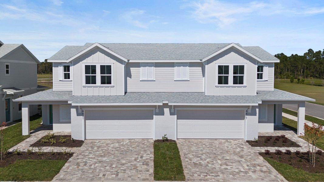 The Monterey elevation at Cyrene at Harmony, new construction home with modern two-car garage and luxury finishes.