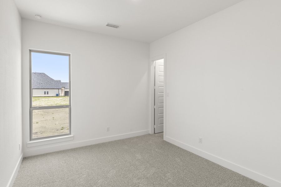 Spacious, unfurnished interior of a new home in Nelson Lake Estates, Rockwall (Image 27). Spacious, unfurnished interior of a new home in Nelson Lake Estates, Rockwall (Image 27).