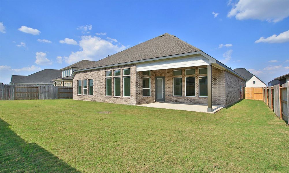 Exterior details and patio area of a home in Brookewater, Rosenberg (Image 2). Exterior details and patio area of a home in Brookewater, Rosenberg (Image 2).