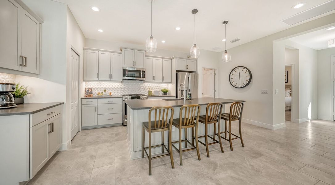 Representative furnished interior of a home built from the Sandcastle 2 by Neal Communities in Vistera of Venice, Venice (Image 13).