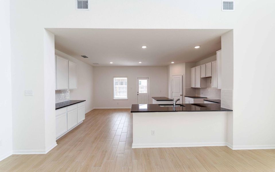 Furnished interior view inside a new home in Swenson Heights, Seguin (Image 6).