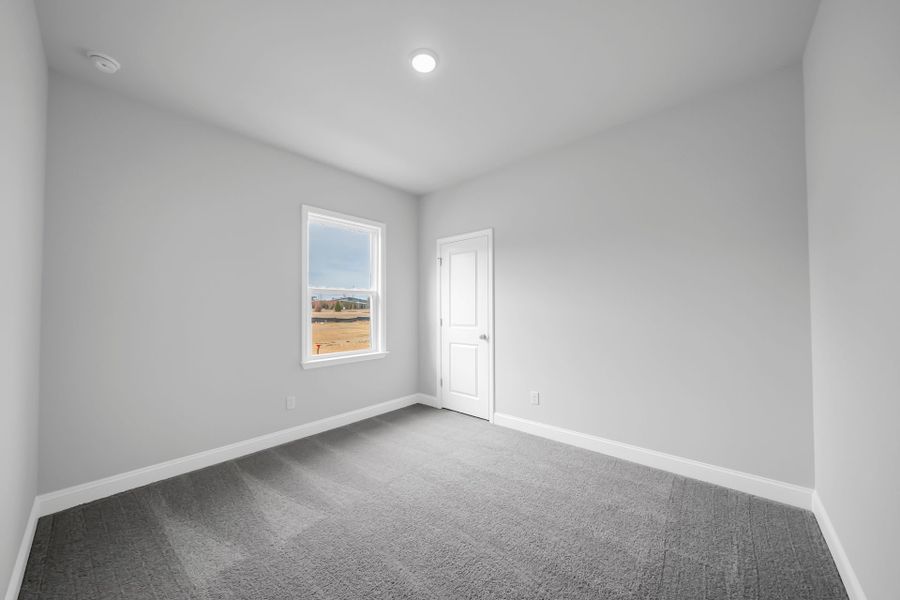 Spacious, unfurnished interior of a new home in Monroe Preserve, Chapin (Image 33).