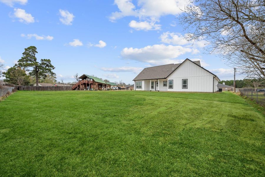 Rear of home from property line. Rear of home from property line.