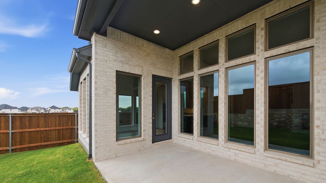 Exterior details and patio area of a home in Mustang Lakes, Celina (Image 4).