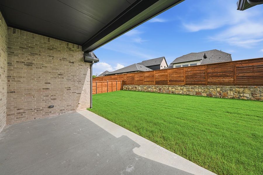 Exterior details and patio area of a home in Solterra Texas, Mesquite (Image 3).