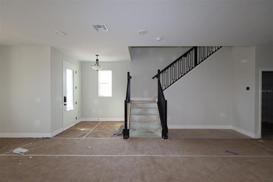 In-progress construction of a new home in Center Lake on the Park, St. Cloud, FL (Image 14).